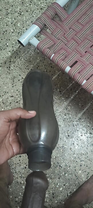 Indian Man Inside The Water Bottle Enjoys Sunni