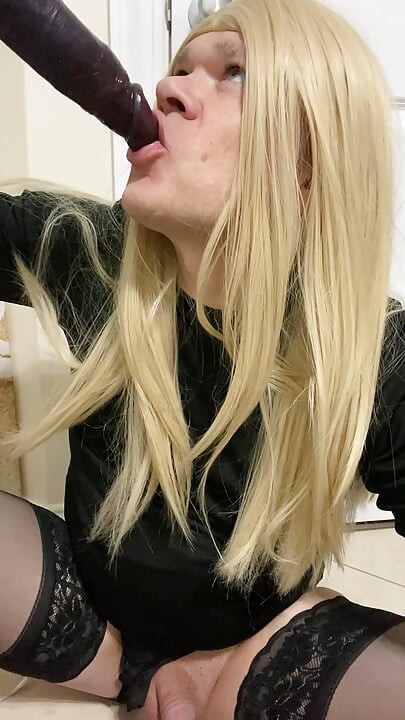 Crossdresser sucking a BBC dildo while talking to Daddy like a good slut