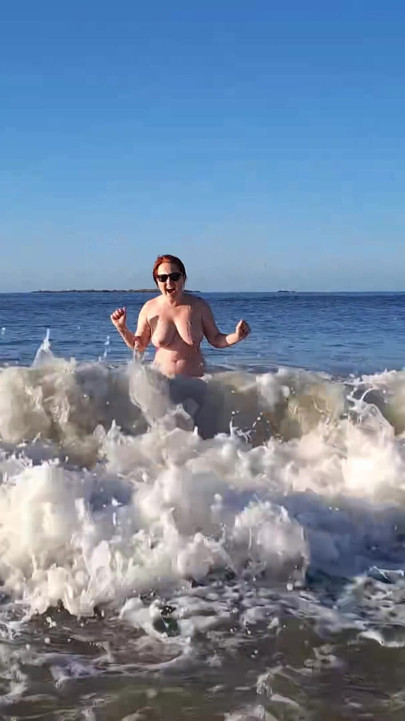 Real nudist Playing Naked in the Ocean Waves | Clip 1