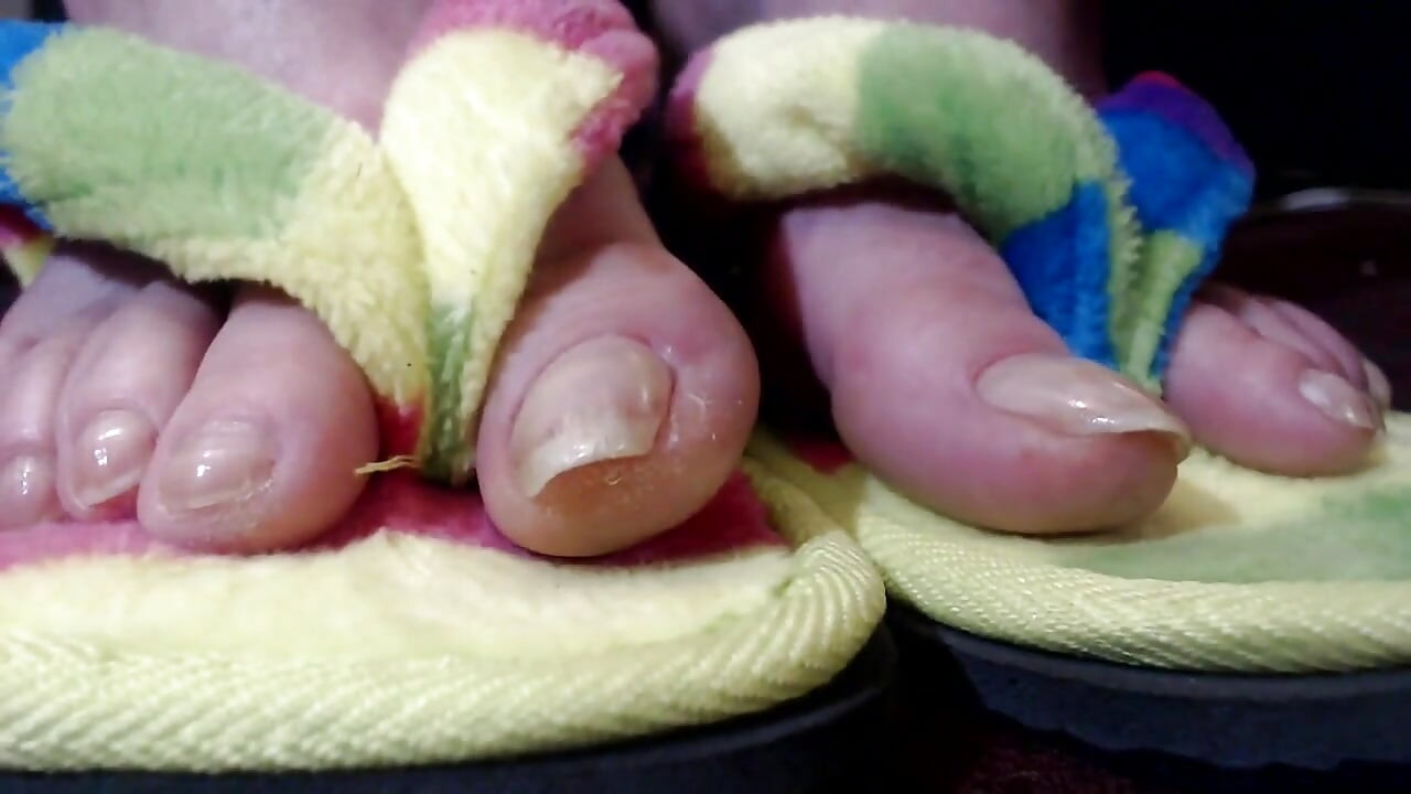 Long natural toenails flip flops