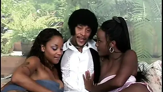 Ladies man has his dick sucked by two eager sluts in bed