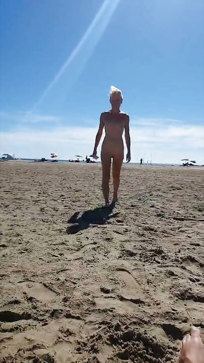 Milf riding a loaded dick on a nudist beach