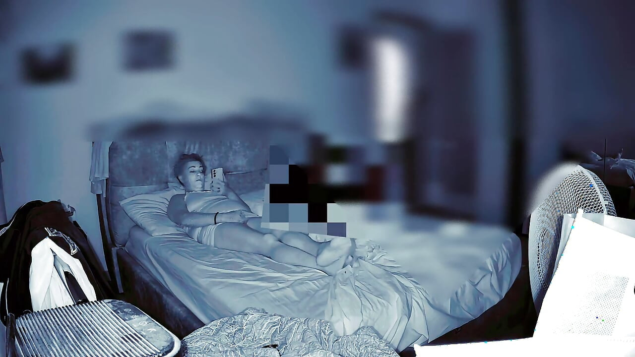 Wife Secretly Masturbates in the Room While Her Husband Is at Home and Watches Her