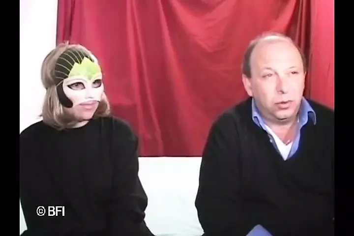 Masked Redhead From Milan Shows a Group of Men How to Suck Dick