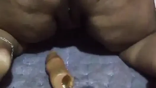 Savita Bhabhi was fucked by putting silicone cucumber in her pussy.