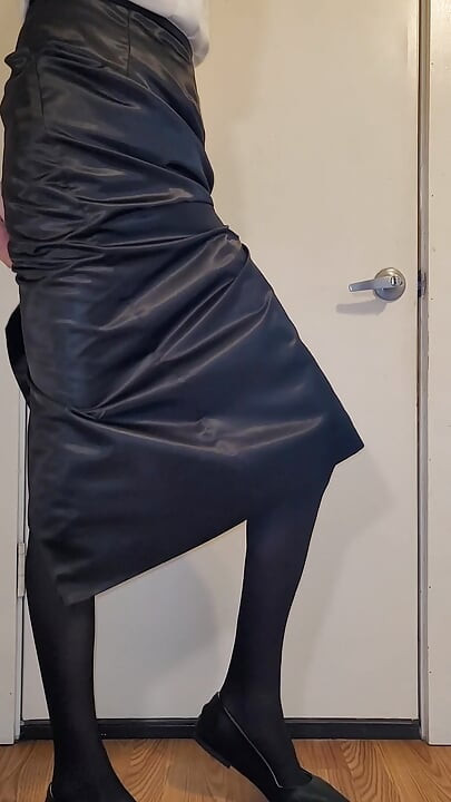 Long black satin skirt with a black satin half slip.