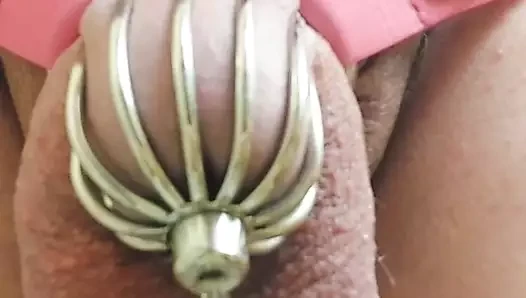 Pissing through the Chastity Cage with 3 inch Urethral Sound Rod