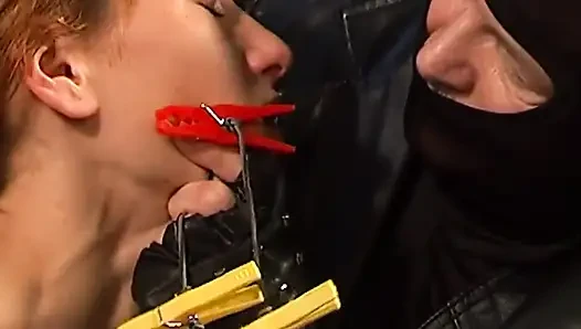 Bound Redhead MILF Takes Tail Plug From Leather Dom