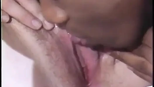 Black man shoves dildo up white man's ass in vintage threesome