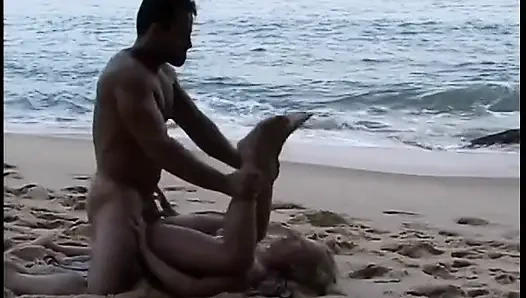 Hot Spanish blonde gets her ass drilled on the beach and takes a facial