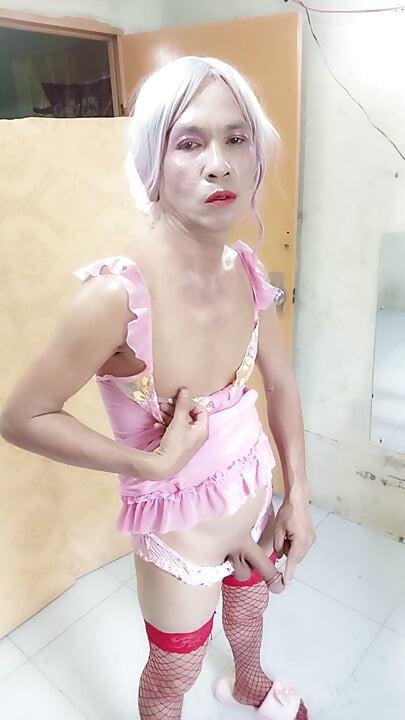 Oanh Le transgender wearing sexy and pornographic clothes standing and screaming is extremely happy