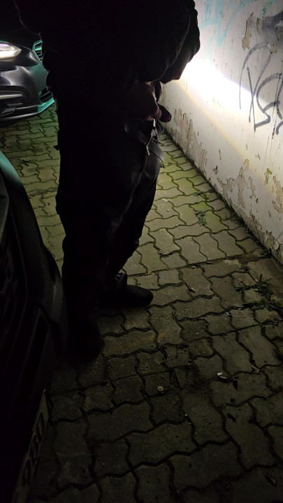 Peeing against a wall