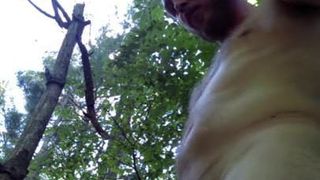 Amateur guy pissing in the woods
