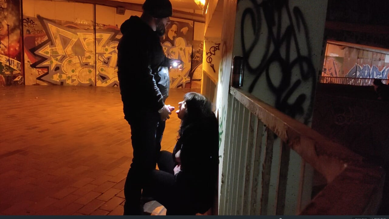 Whore degraded in parking garage