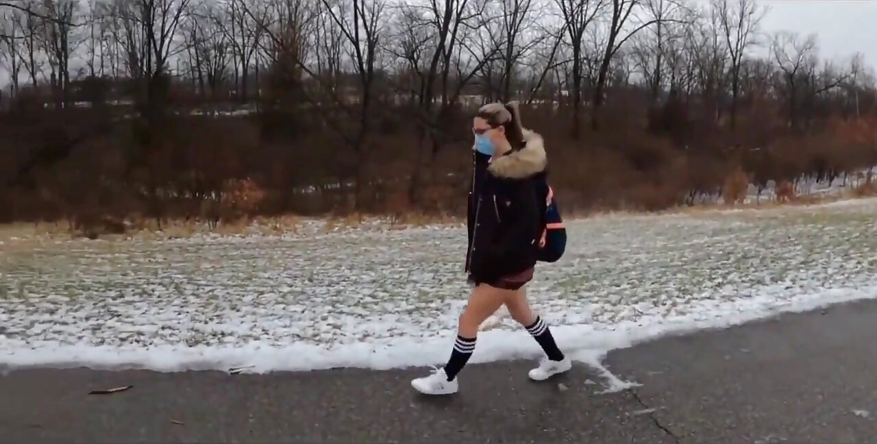 Teen Girl in Plaid Skirt Gets a Ride to School From a Stranger on a Snowy Day