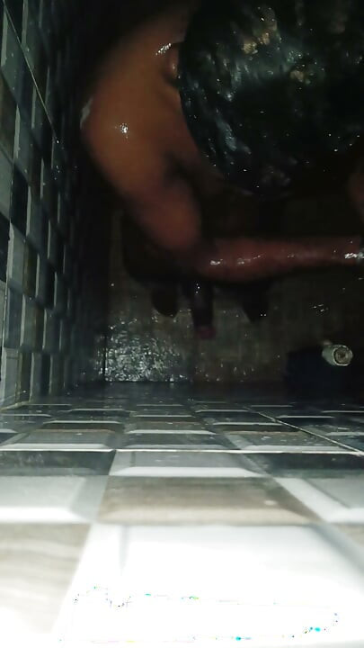 Hot Indian man bathing and playing and cleaning his big cock