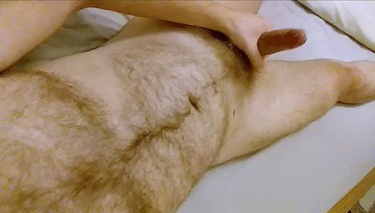 Wanking my uncut cock and cumming in bed