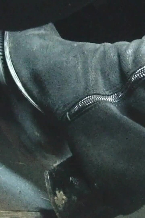 Driving Fast in Black Suede Knee High Boots