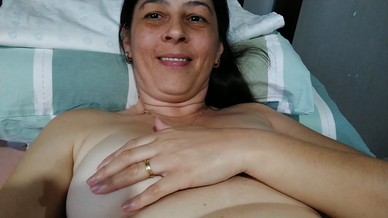 Watch this wife touching her naked body.
