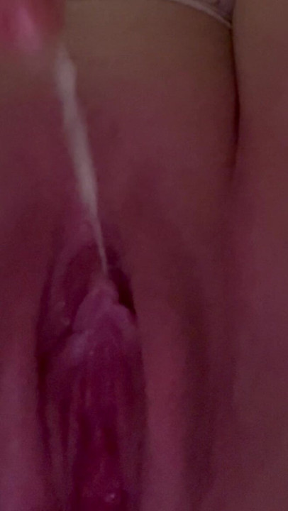 Slut plays with her cum