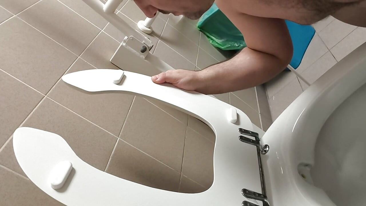 Licking Public Toilet