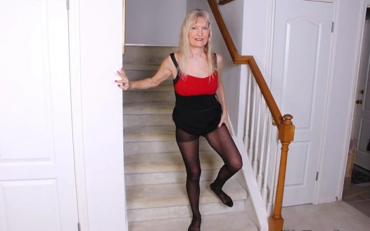 Granny Claire From the Usa Spreads Her Tight and Pantyhosed Pussy on the Stairs