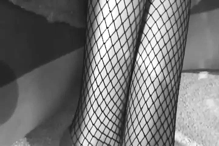 A Big Black Cock Doggystyle Bangs the Round Ass of a Black Pussy in Fishnet Stockings 