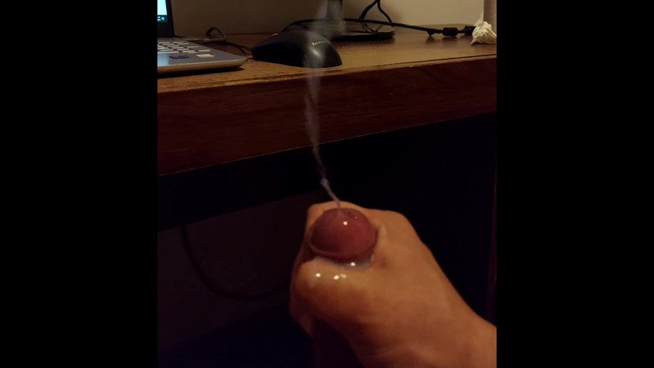 Cumshot while watching porn