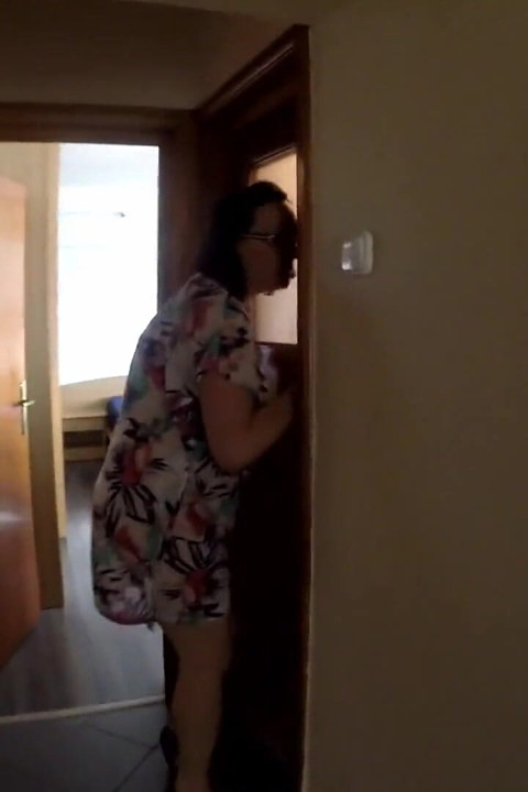 Desperate to pee, she has to pee on the balcony