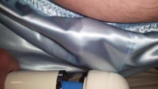 Masturbating and vibrating to orgasm in blue satin