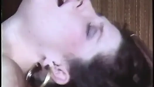 Black man shoves dildo up white man's ass in vintage threesome