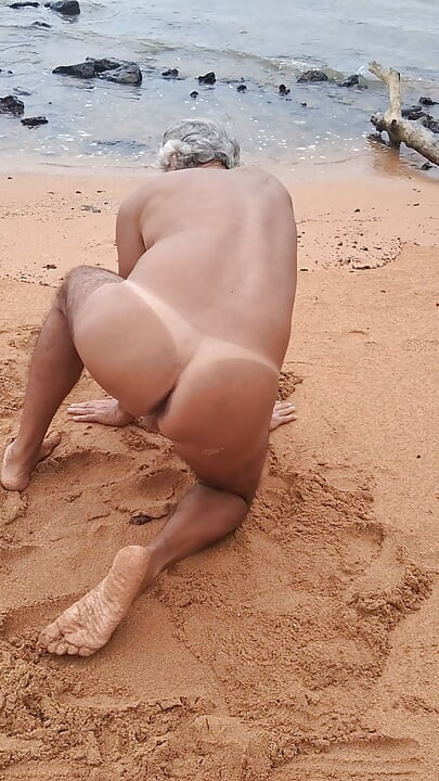 Ladysilva on the beach naked showing off her big sexy ass tanned with mark
