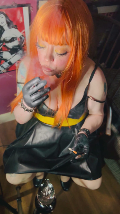 Redhead Tina Snua Smoking 2 Cigarettes At A Time Wearing A Leather Dress & Gloves | Clip 1