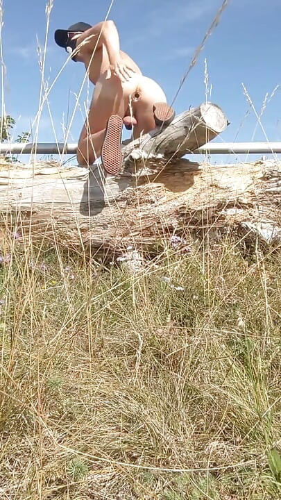 Risky outdoor nude walk with chastity cage and anal play