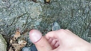 Cumming while standing in a creek - from two different angles