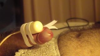 Close up of CD Cumming Hands Free with Vibrator