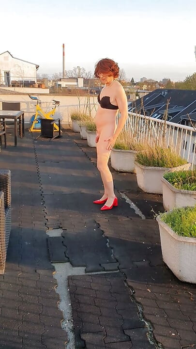 Naked on the roof terrace