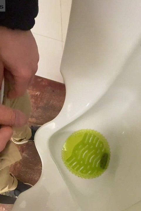 Amateur Redhead Guy Caught Pissing in a Public Toilet's Urinal - He Then Quickly Plays with His Cock Before Leaving