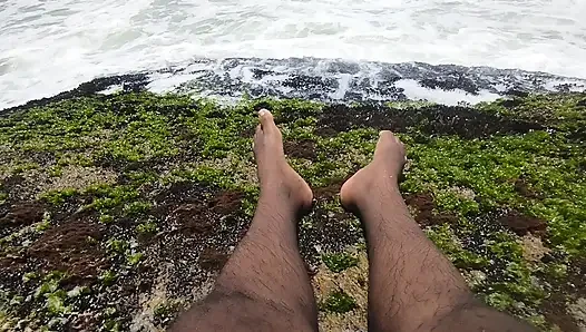 massaging my feet on the beach