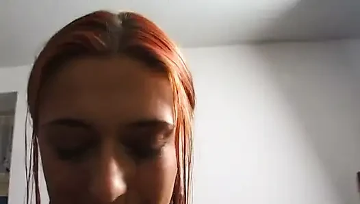 Amazing redhead blowing cock