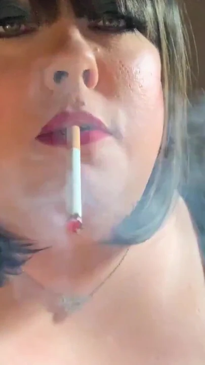 Captivating moment from "BBW Tina Snua Chain Smoking Cigarettes With Nose Exhales"