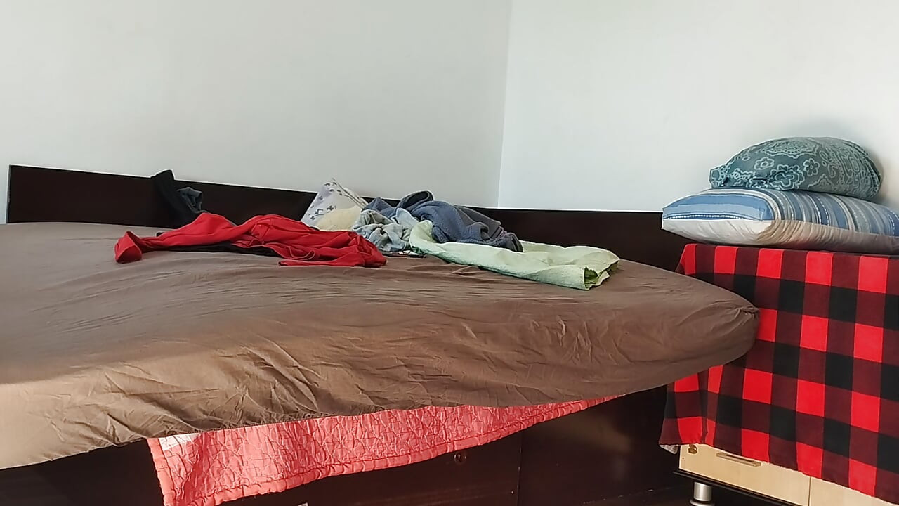 Amateur woman has fun trying on clothes and cutting them. Amateur woman vacuuming naked in the house.