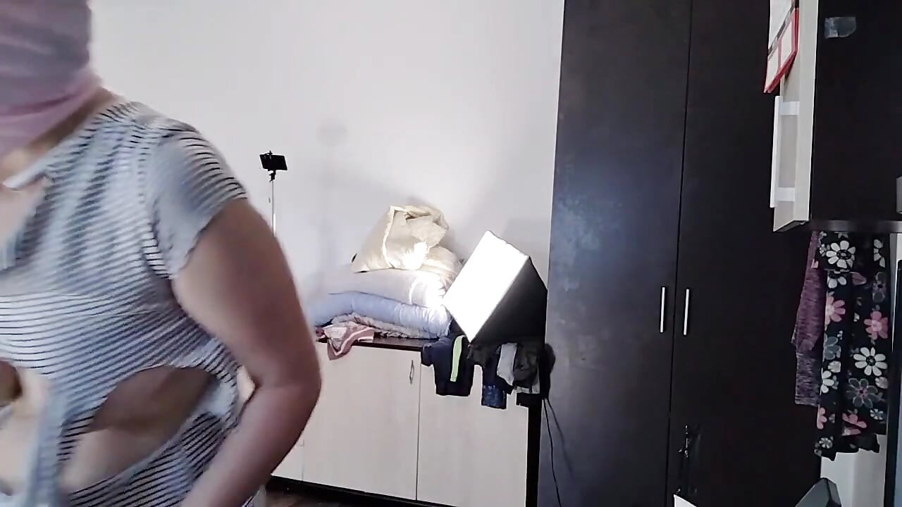 Sexy Latina Tries on and Cuts Clothes. Sexy Latina with Hairy