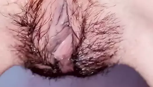 Touching my wet pussy.