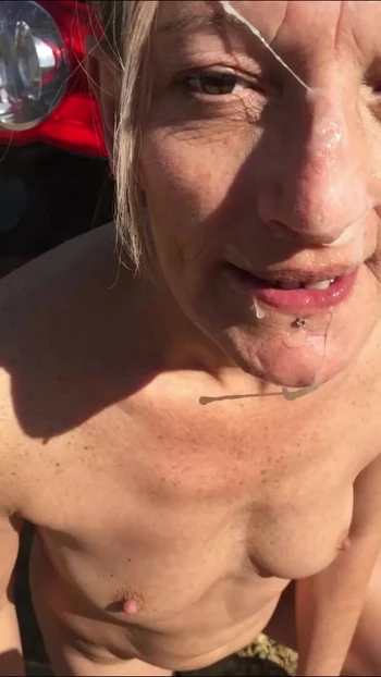 Emotional moment from "outdoor exhibitionist gets cumshot facial"