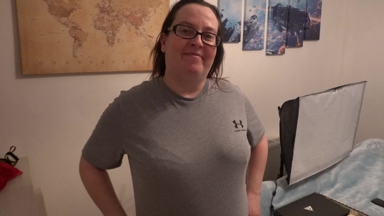 Big Breast wife showing off her assets