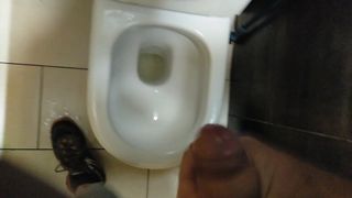pissing in public bathroom