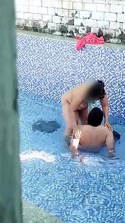 Key moment from "A neighboring couple was seen secretly having sex in the swimming pool."