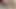 Petite redhead masturbates on soft fur carpet. Solo female