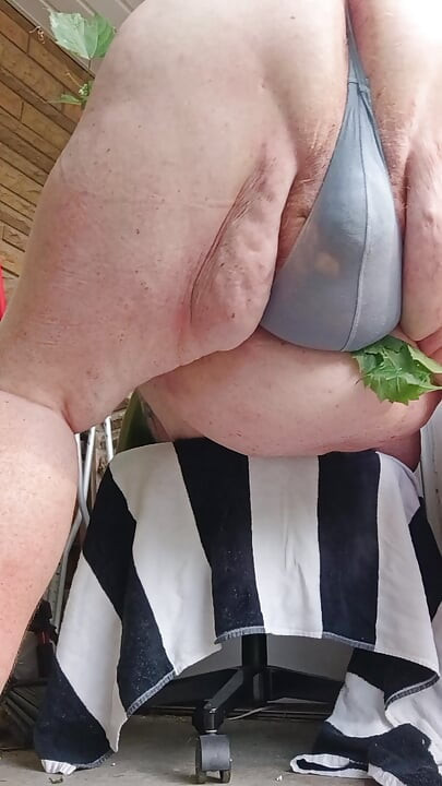 Early morning porch thong.  Fat guy slaps his nuts n shows ass